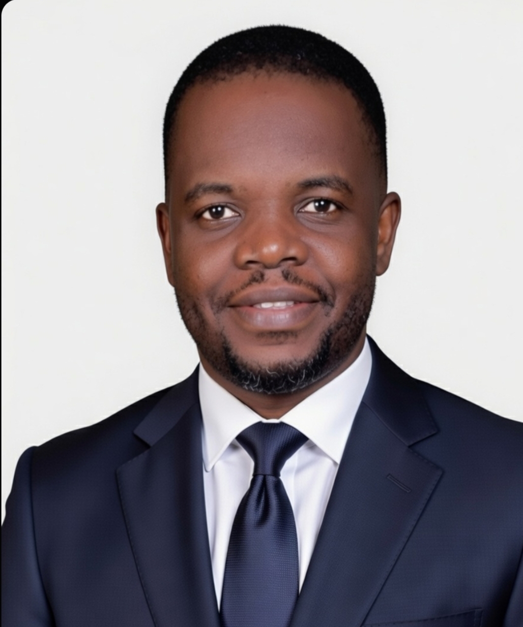 Dr. Tukundane Benson